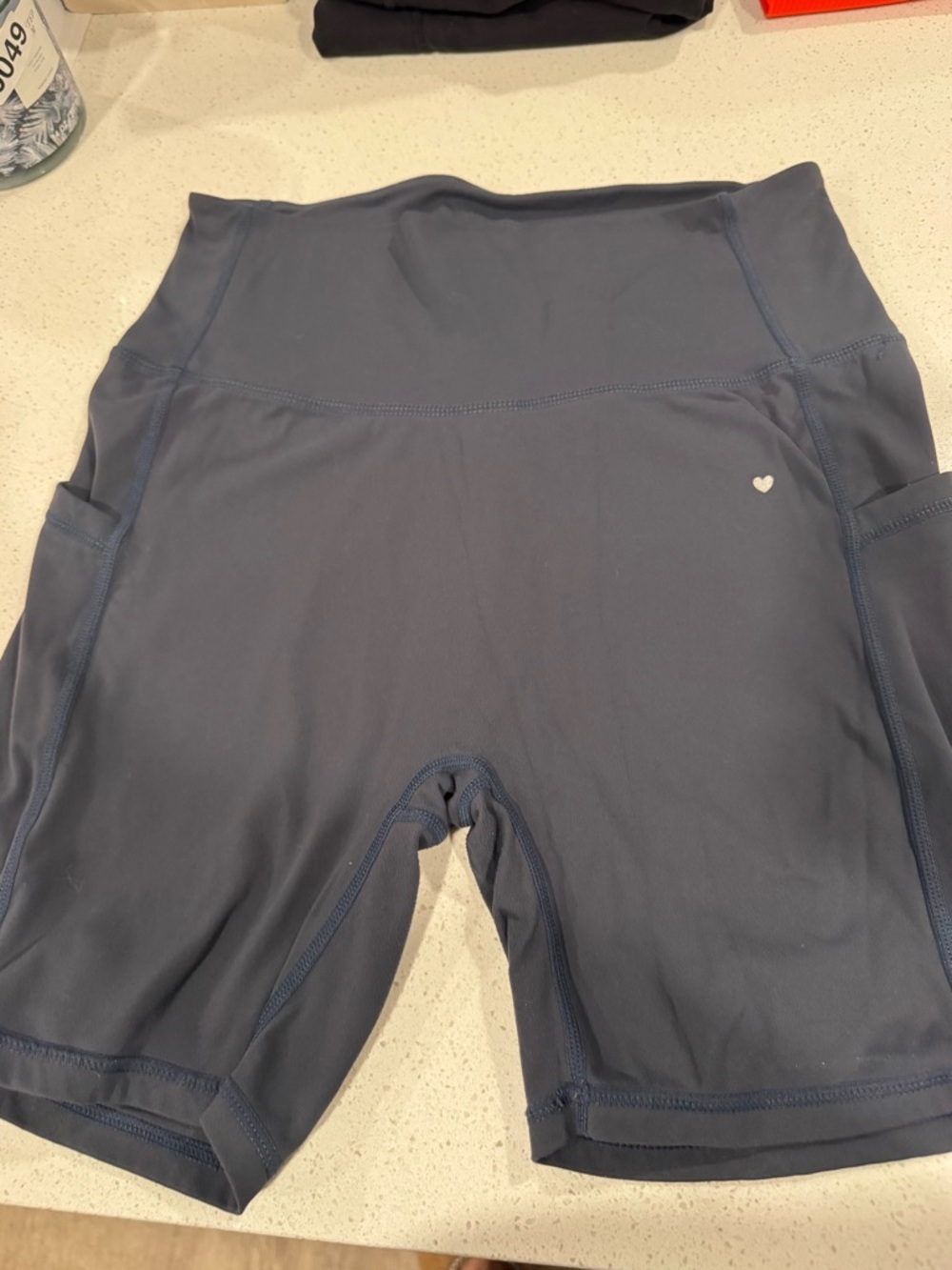 High-Rise Blue Bike Shorts with Subtle Heart Accent